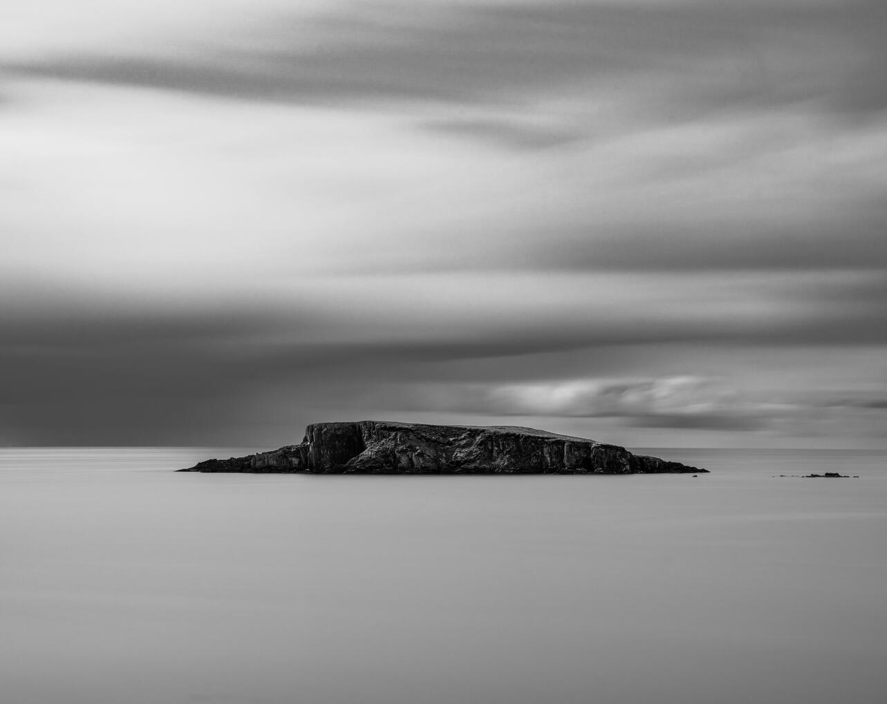 Adam Island: Stillness Black and white long-exposure photograph of Adam Island in Glandore Harbour, West Cork, Ireland.