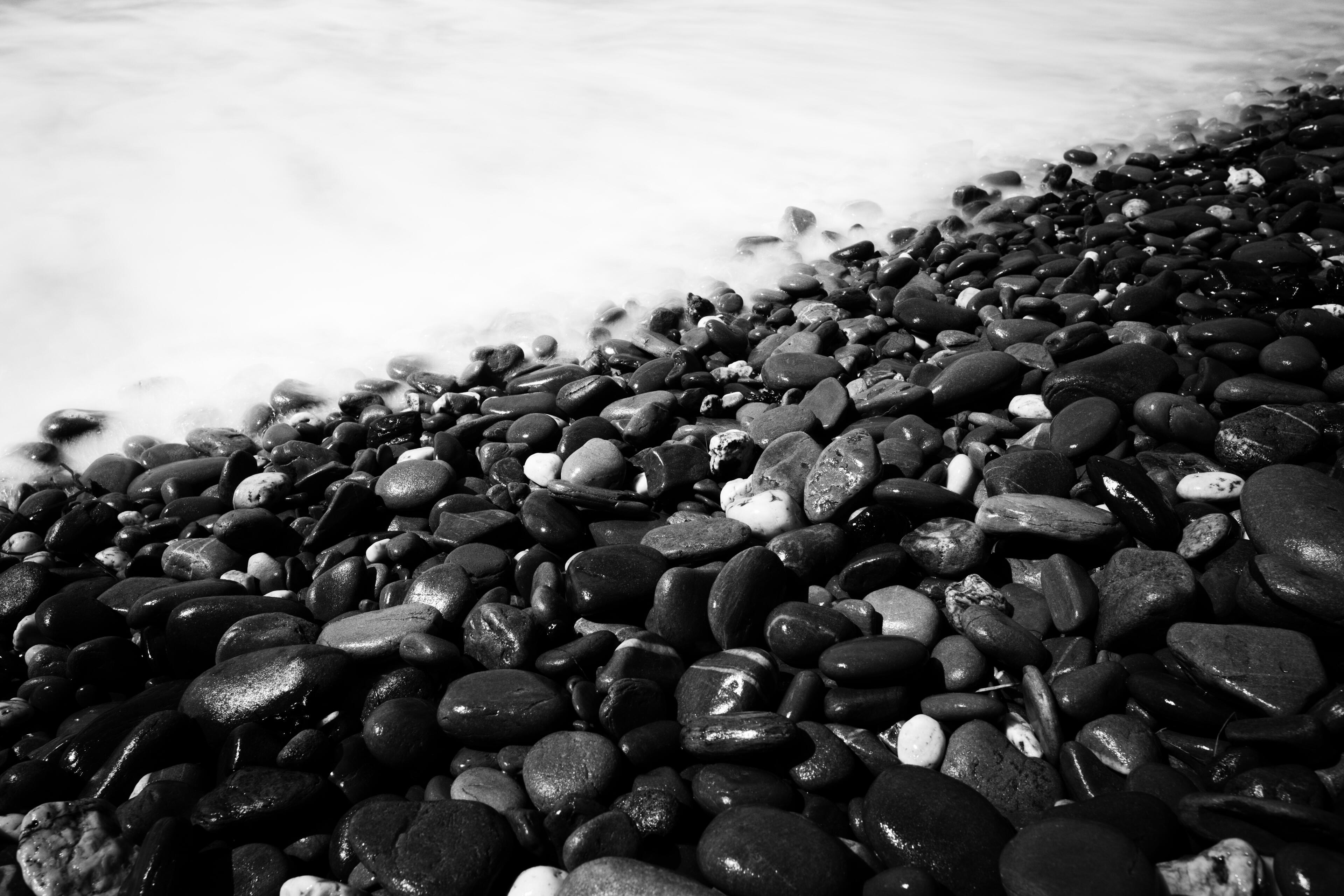 The Space Where Stones and Water Meet Here, the sea never truly stops, yet in a single moment it becomes still. The stones have waited through countless tides, while the water whispers across them without a sound. Sometimes the most powerful part of a landscape isn't what is moving... It's th